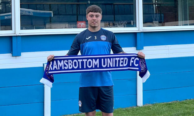 LEFT BACK DEAN JOINS THE RAMS