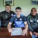 ACADEMY STUDENT SIGNS FIRST TEAM PAPERS