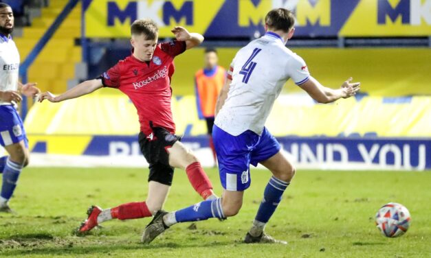 HEADS HELD HIGH AT GIGG LANE