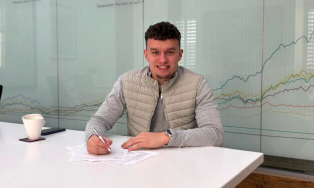 HOLLAND-WILKINSON COMMITS TO THE CLUB